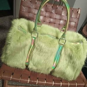 Clubexx fuzzy weekender bag lime green (RARE) color is no longer sold.